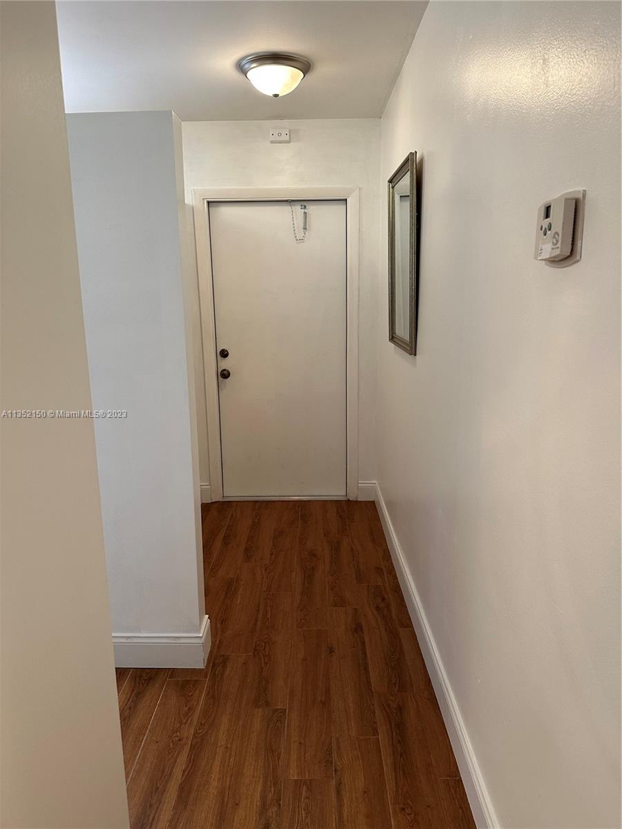 250 Gate Road, Unit 258 Hollywood, FL 33024 - Photo 8 of 30 a view of a hallway