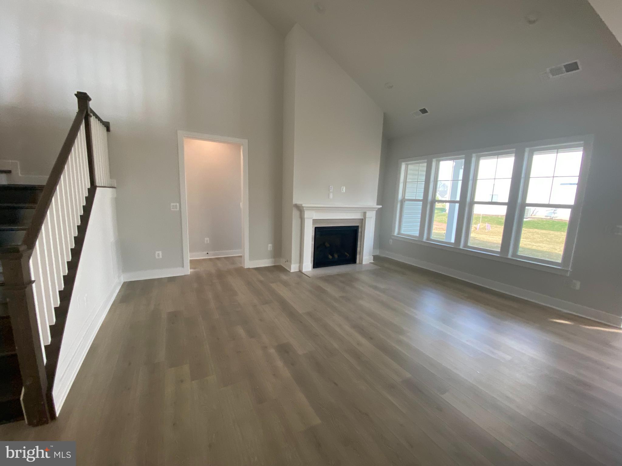 53 Gentle Slope Way Gettysburg, PA 17325 - Photo 11 of 29 a view of an empty room with wooden floor and a window