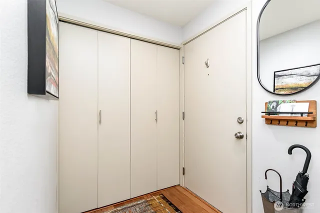 a bathroom with a shower and a sink