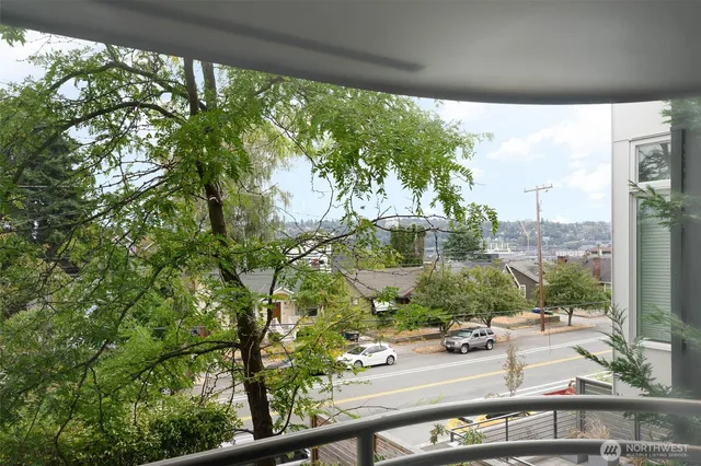 a view of a street from a balcony