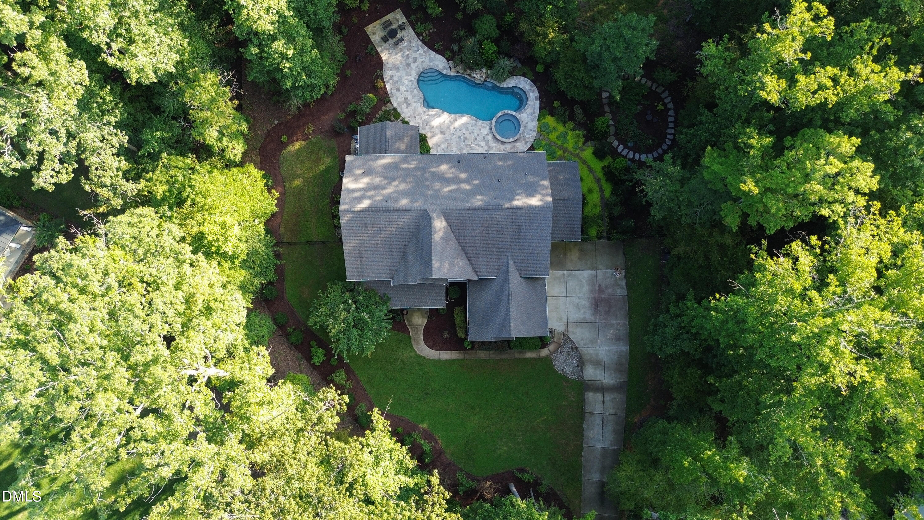 3939 River Stone Road Durham, NC 27705 - Photo 3 of 9 an aerial view of a house with a yard