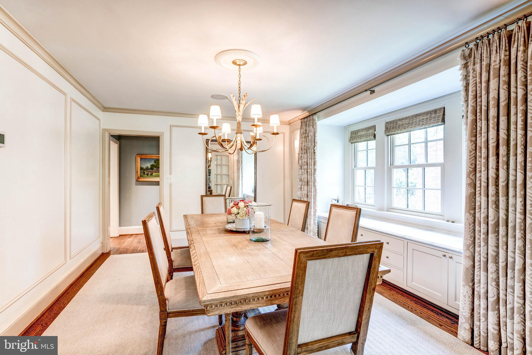 4509 Wetherill Road Bethesda, MD 20816 - Photo 17 of 89 a view of a dining room with furniture window and wooden floor