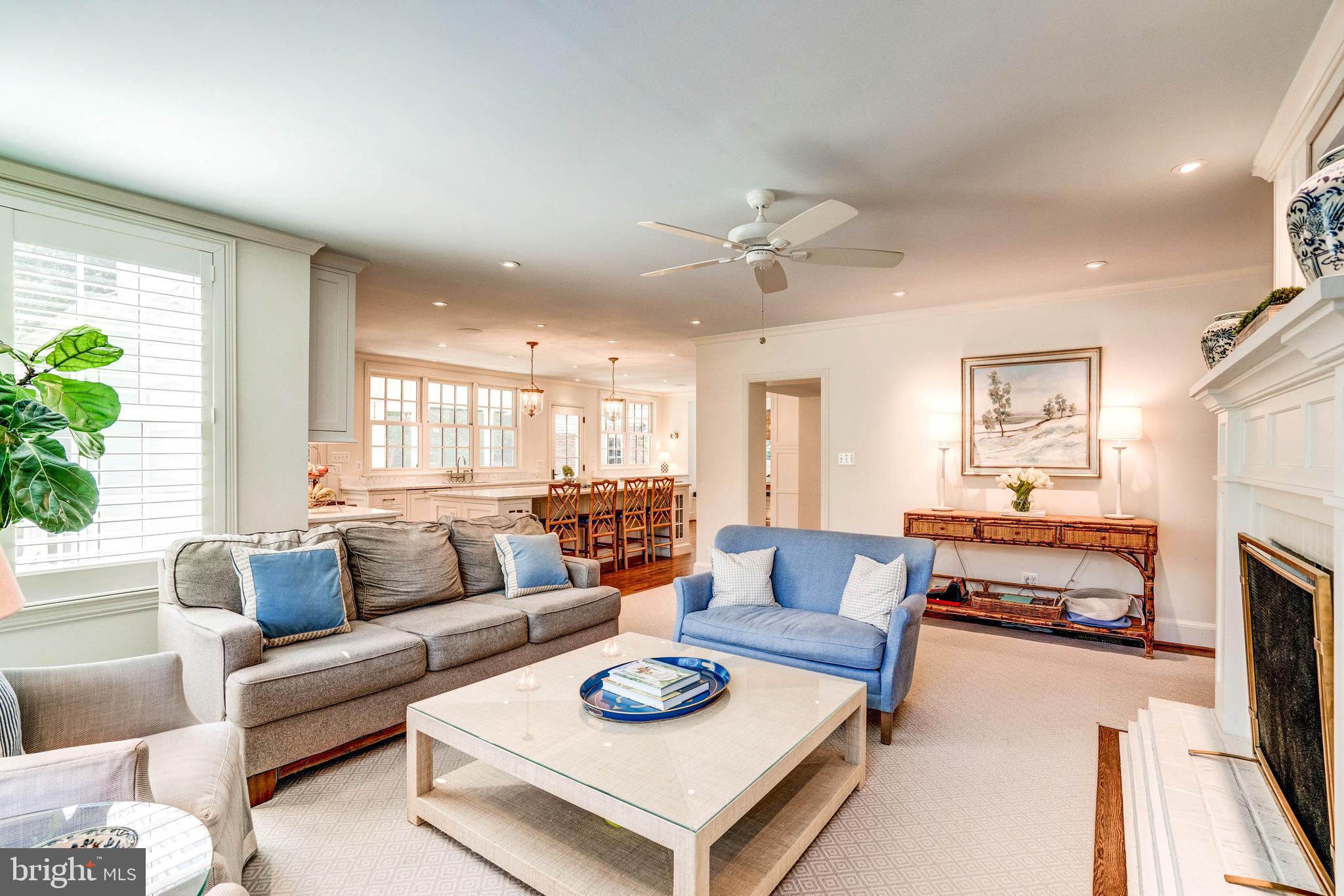 4509 Wetherill Road Bethesda, MD 20816 - Photo 20 of 89 a living room with furniture and a fireplace