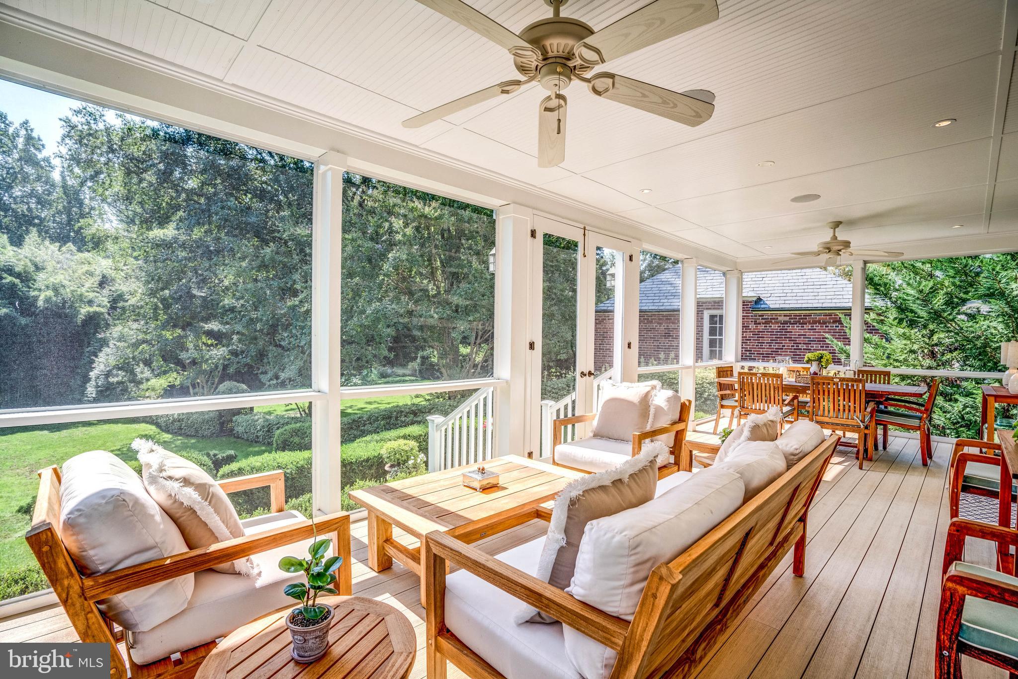 4509 Wetherill Road Bethesda, MD 20816 - Photo 38 of 89 a living room with furniture and a large window