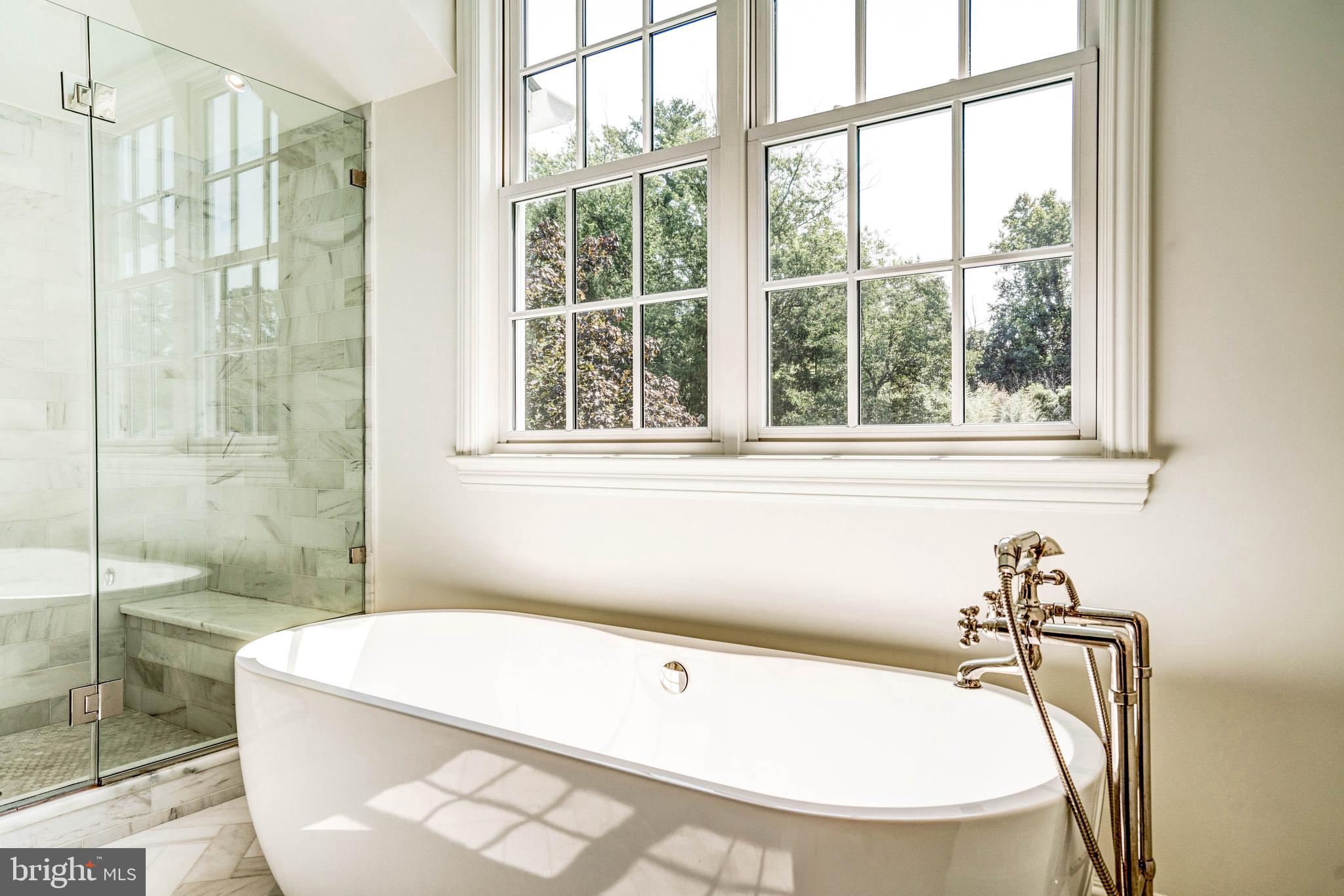 4509 Wetherill Road Bethesda, MD 20816 - Photo 51 of 89 a white bath tub sitting next to a shower