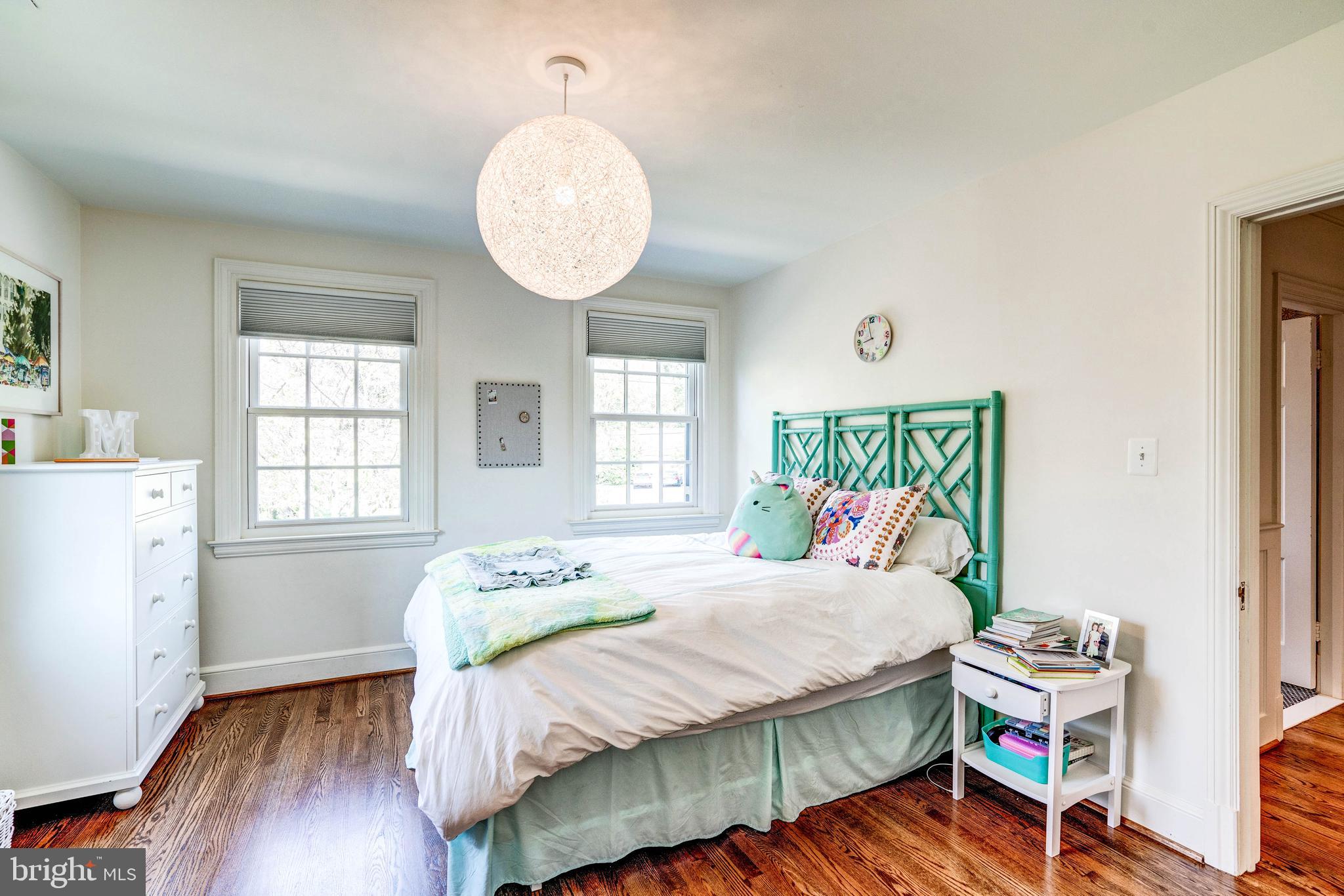 4509 Wetherill Road Bethesda, MD 20816 - Photo 59 of 89 a bedroom with a bed and wooden floor