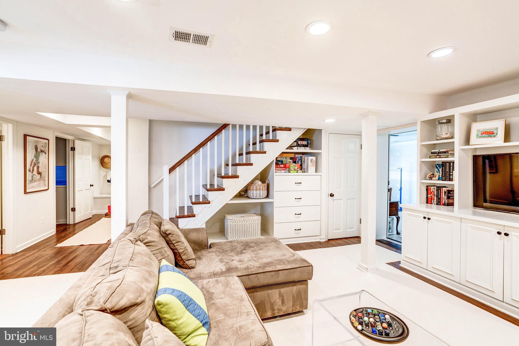 4509 Wetherill Road Bethesda, MD 20816 - Photo 69 of 89 a living room with furniture and cabinets