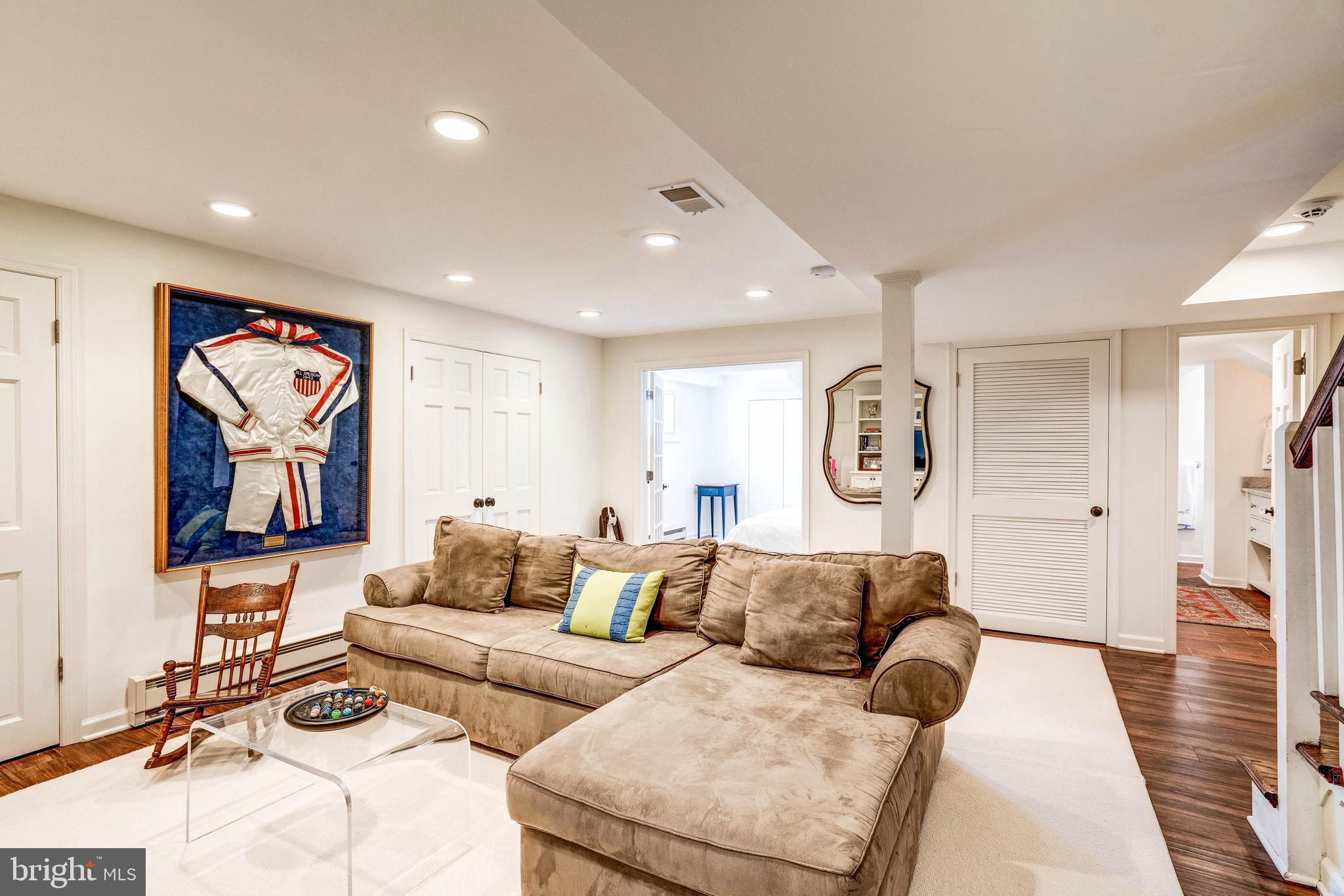 4509 Wetherill Road Bethesda, MD 20816 - Photo 71 of 89 a living room with furniture and wooden floor