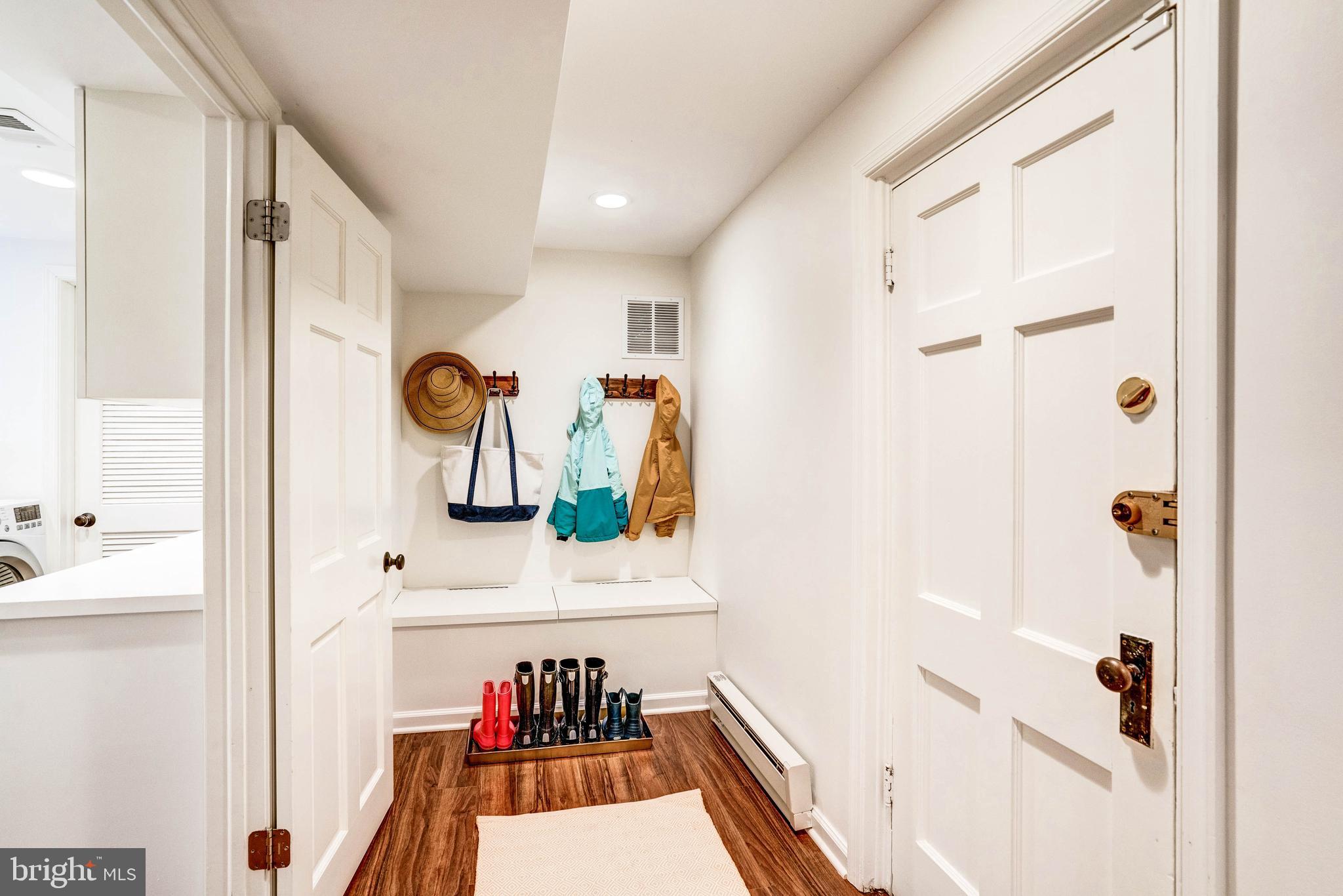4509 Wetherill Road Bethesda, MD 20816 - Photo 82 of 89 a view of walk in closet with clothes and shoes