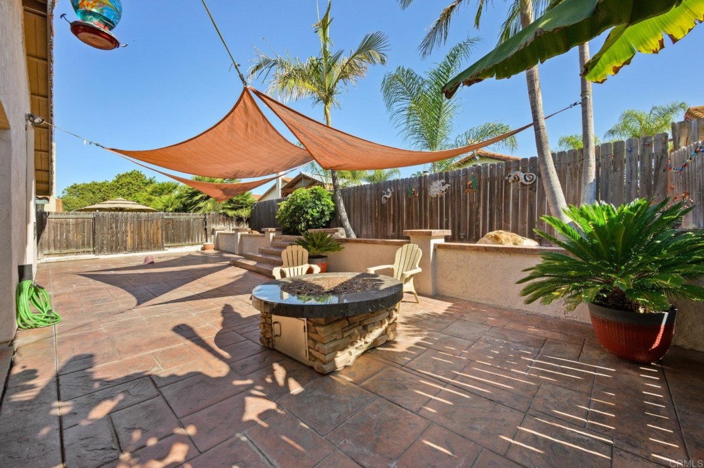228 Ocotillo Place Oceanside, CA 92057 - Photo 21 of 31 a view of a chairs and table in the patio
