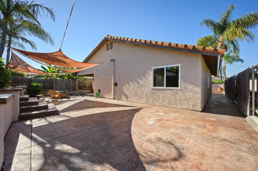 228 Ocotillo Place Oceanside, CA 92057 - Photo 24 of 31 a view of a house with backyard and sitting area