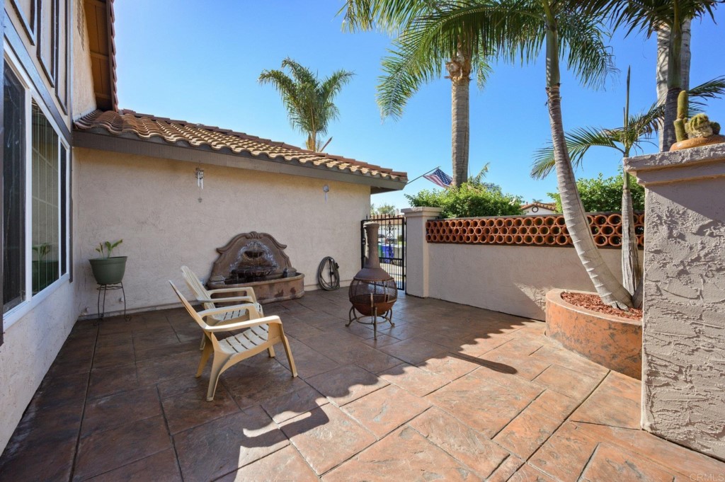 228 Ocotillo Place Oceanside, CA 92057 - Photo 5 of 31 a view of a chairs and tables in patio