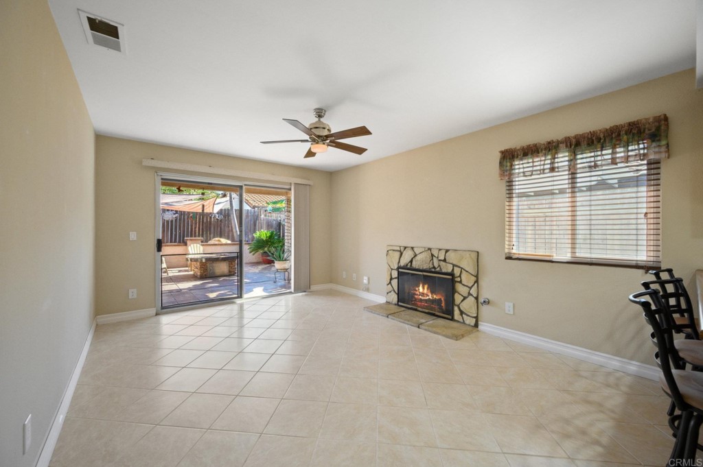 228 Ocotillo Place Oceanside, CA 92057 - Photo 9 of 31 a living room with furniture and a flat screen tv