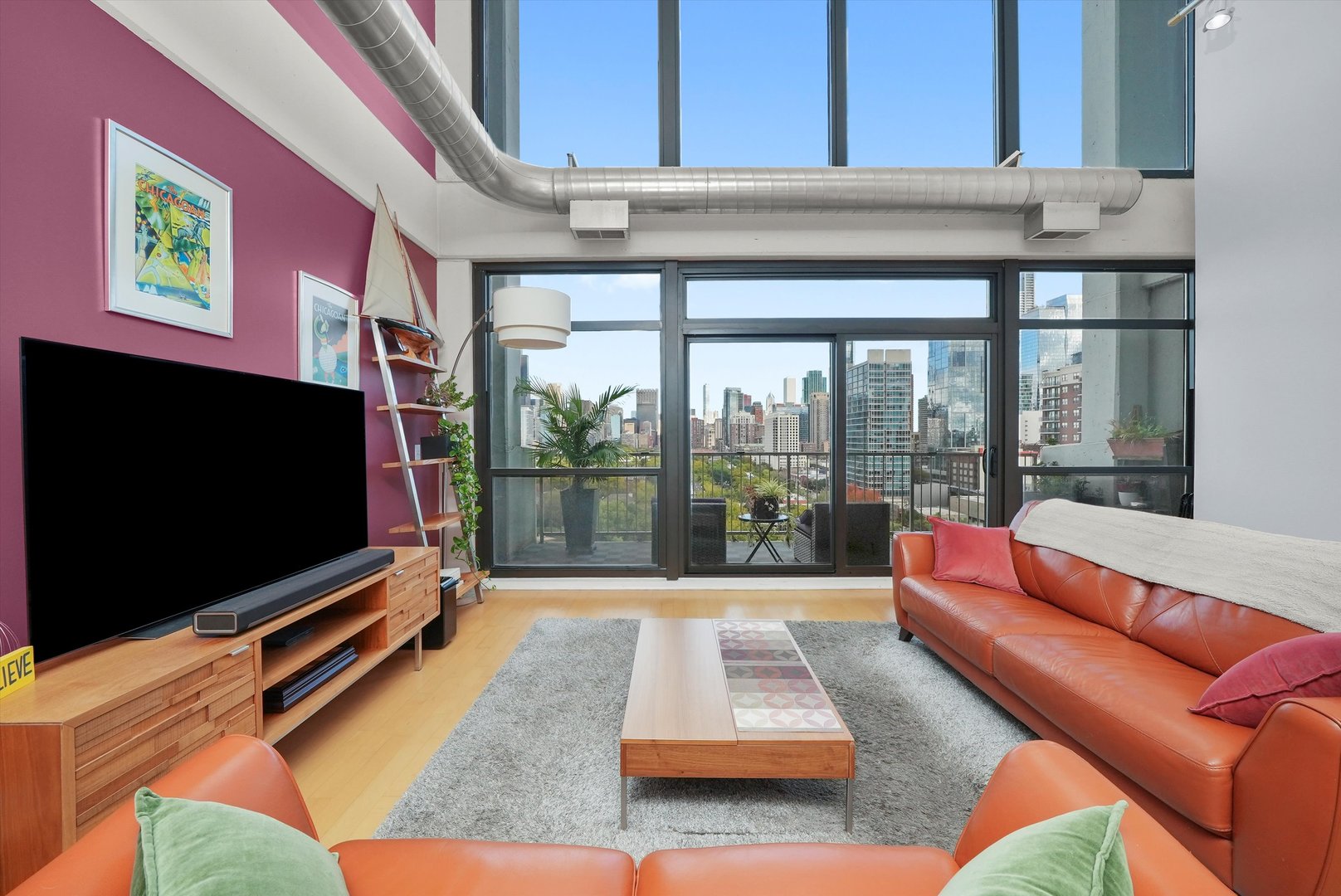 1530 South State Street, Unit 1004 Chicago, IL 60605 - Photo 3 of 38 a living room with furniture tv and a large window