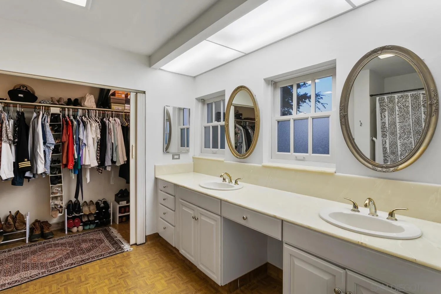 3443 Freeman Street San Diego, CA 92106 - Photo 15 of 35 a bathroom with a sink and a mirror