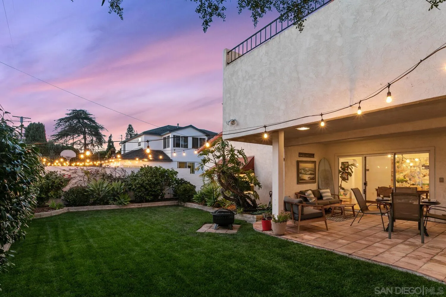 3443 Freeman Street San Diego, CA 92106 - Photo 17 of 35 a view of a patio with table and chairs and potted plants