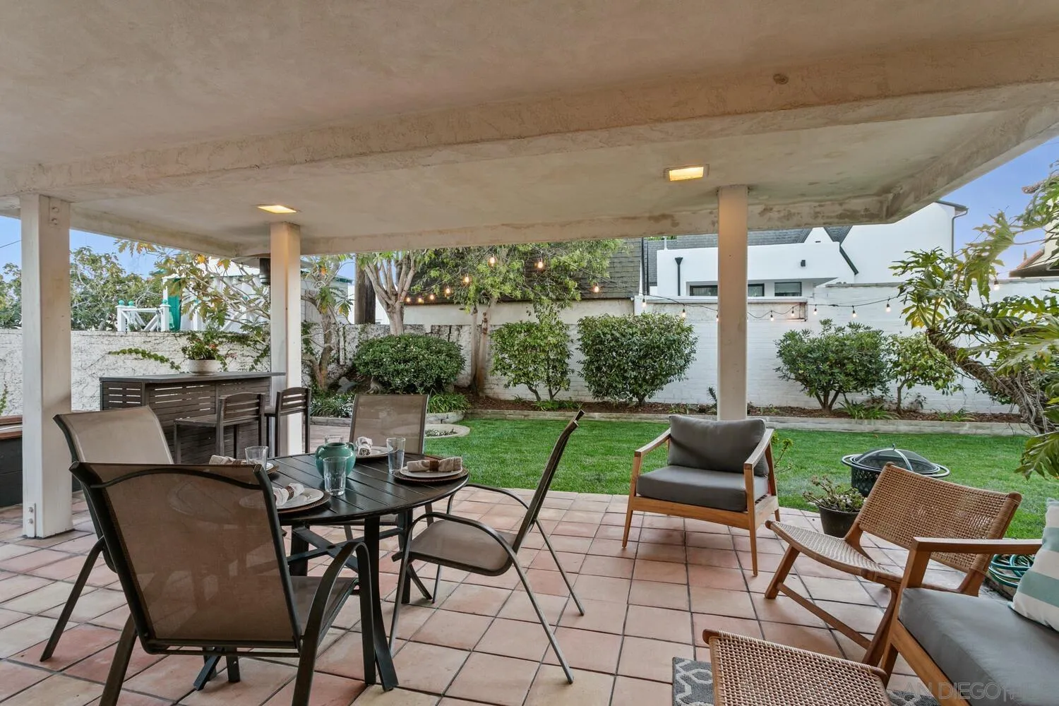 3443 Freeman Street San Diego, CA 92106 - Photo 19 of 35 a view of an chairs and table in patio with a yard
