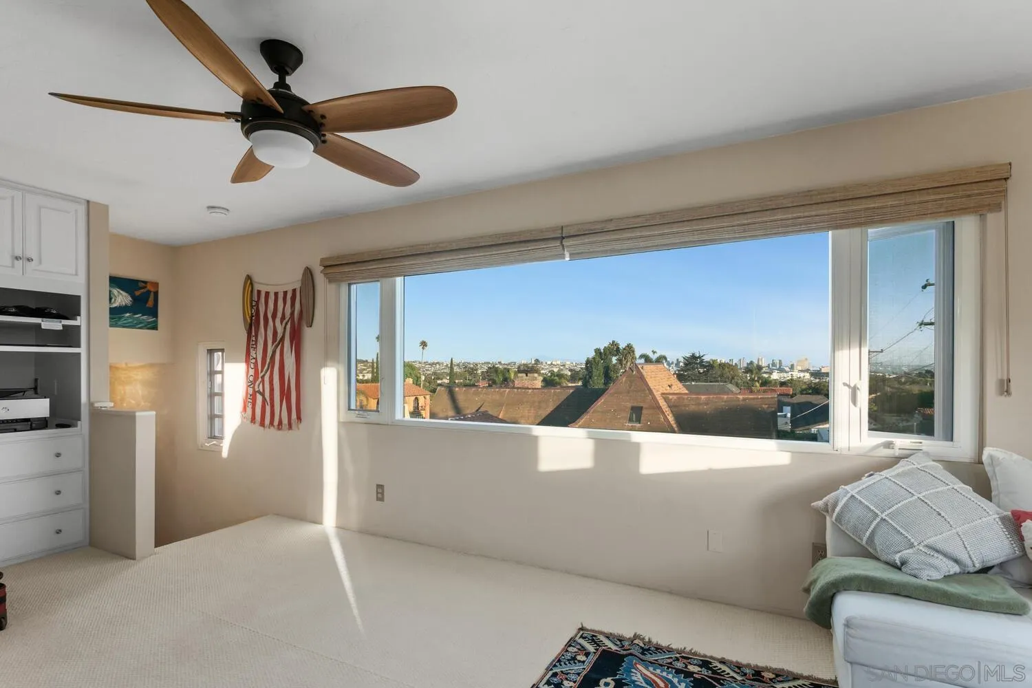 3443 Freeman Street San Diego, CA 92106 - Photo 22 of 35 a view of a living room a window and a chandelier