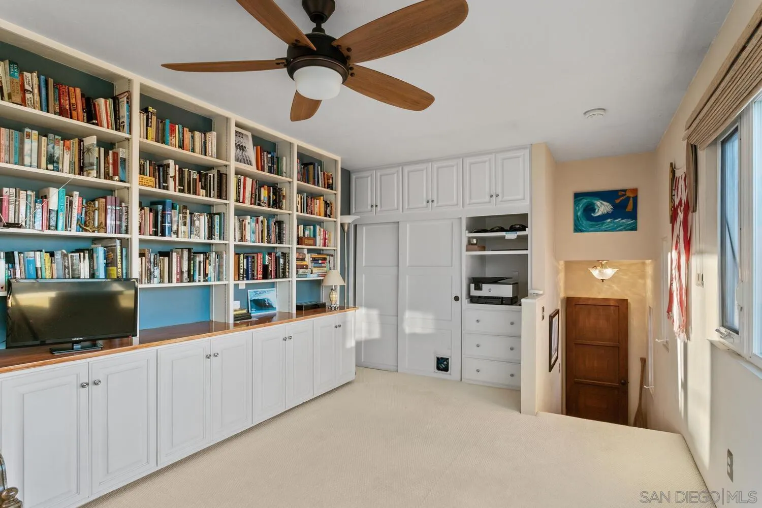 3443 Freeman Street San Diego, CA 92106 - Photo 24 of 35 a kitchen with stainless steel appliances kitchen island a refrigerator and a stove top oven