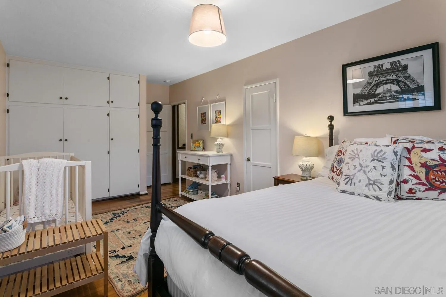 3443 Freeman Street San Diego, CA 92106 - Photo 27 of 35 a bedroom with a bed and a dresser