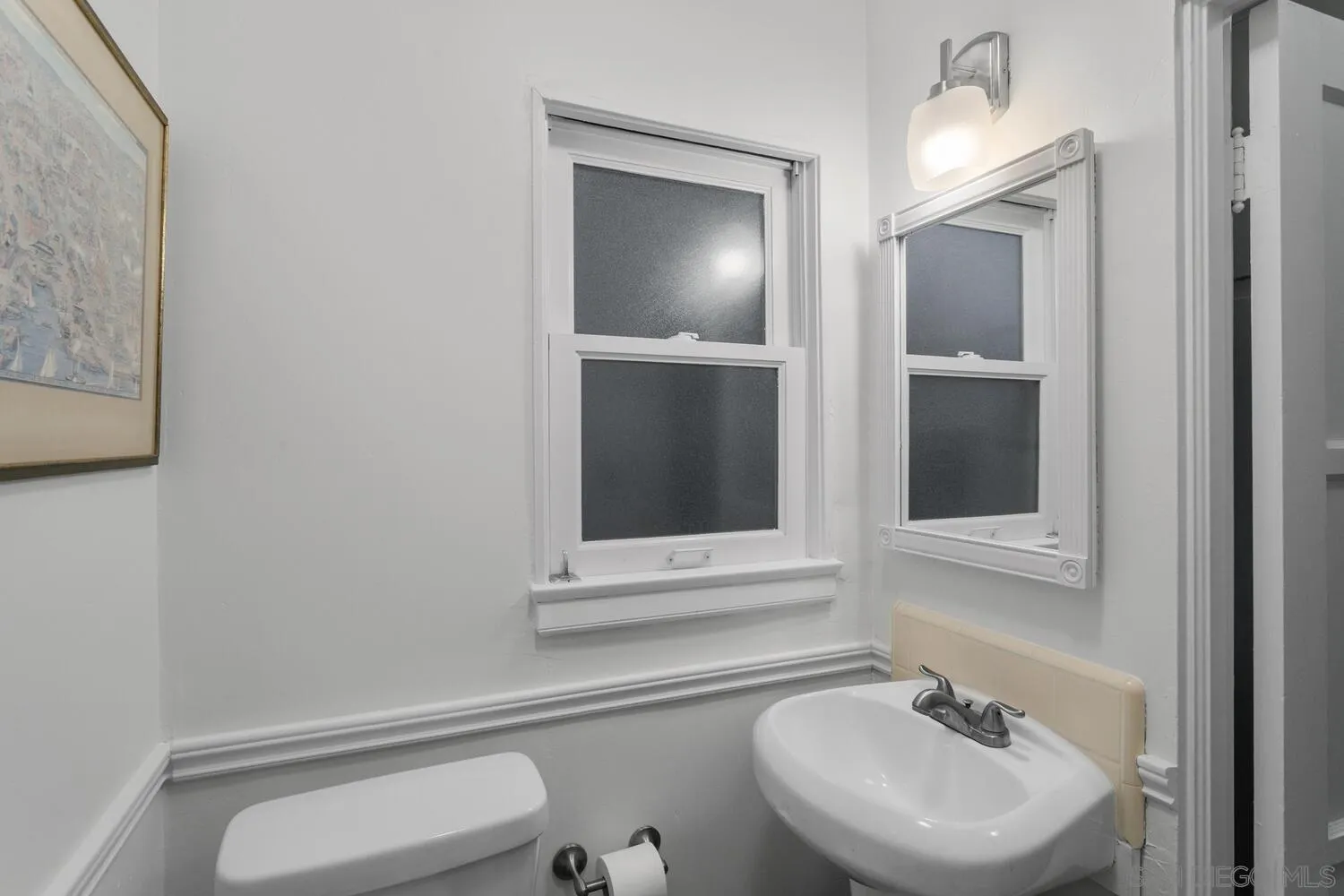 3443 Freeman Street San Diego, CA 92106 - Photo 30 of 35 a bathroom with a sink and a toilet