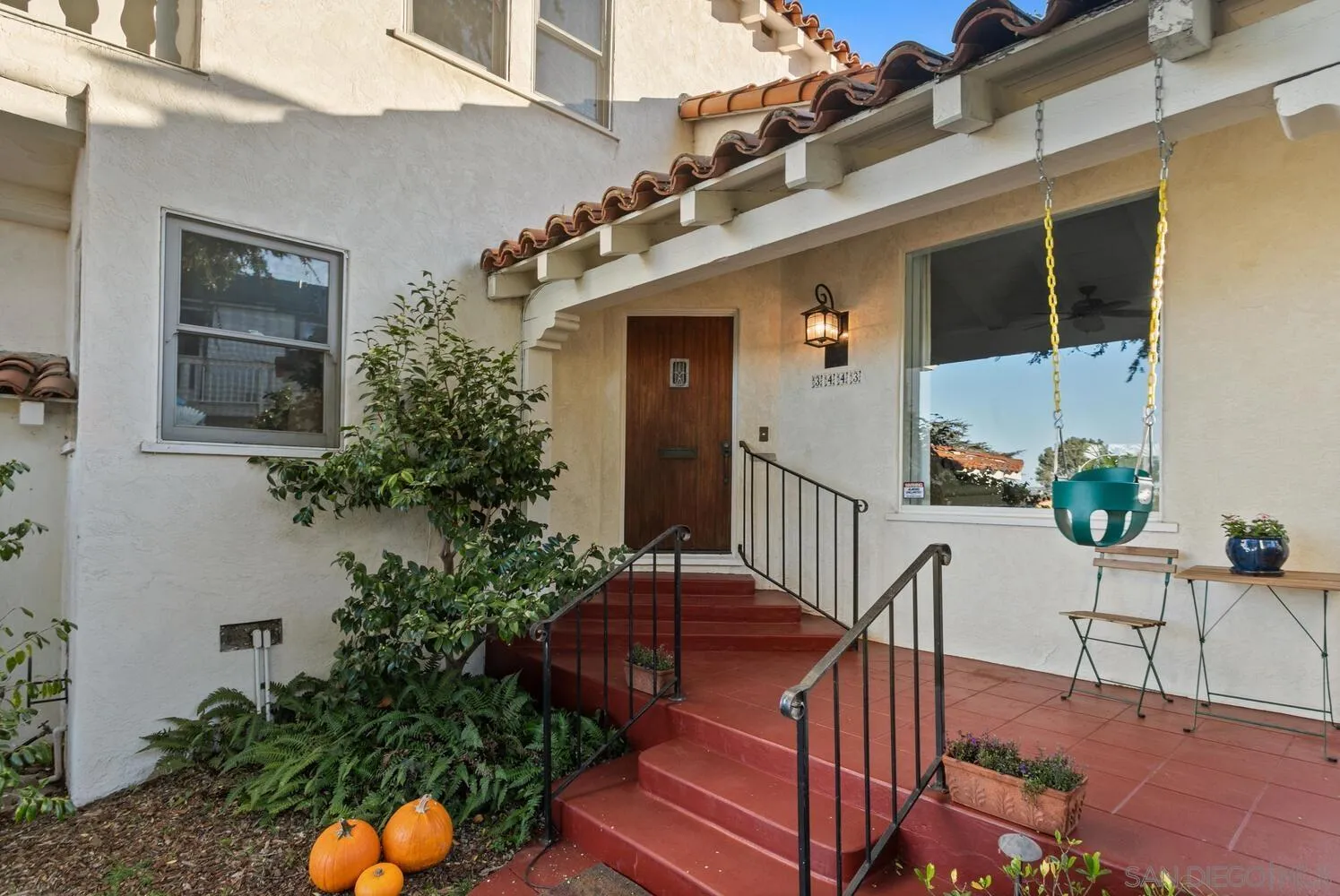 3443 Freeman Street San Diego, CA 92106 - Photo 3 of 35 a view of a chair and table in backyard of the house
