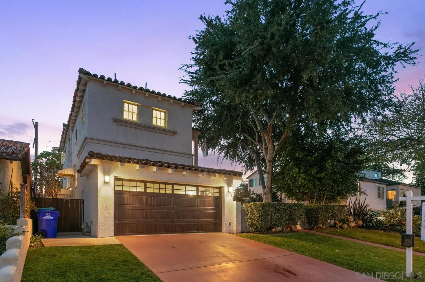 3443 Freeman Street San Diego, CA 92106 - Photo 33 of 35 a front view of a house with a yard and garage