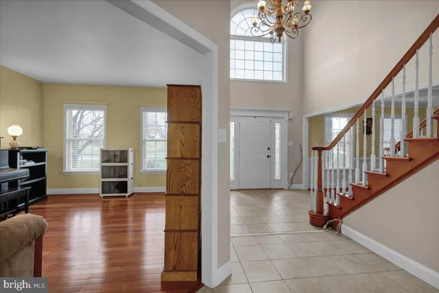 a kitchen with stainless steel appliances granite countertop a stove sink and cabinets