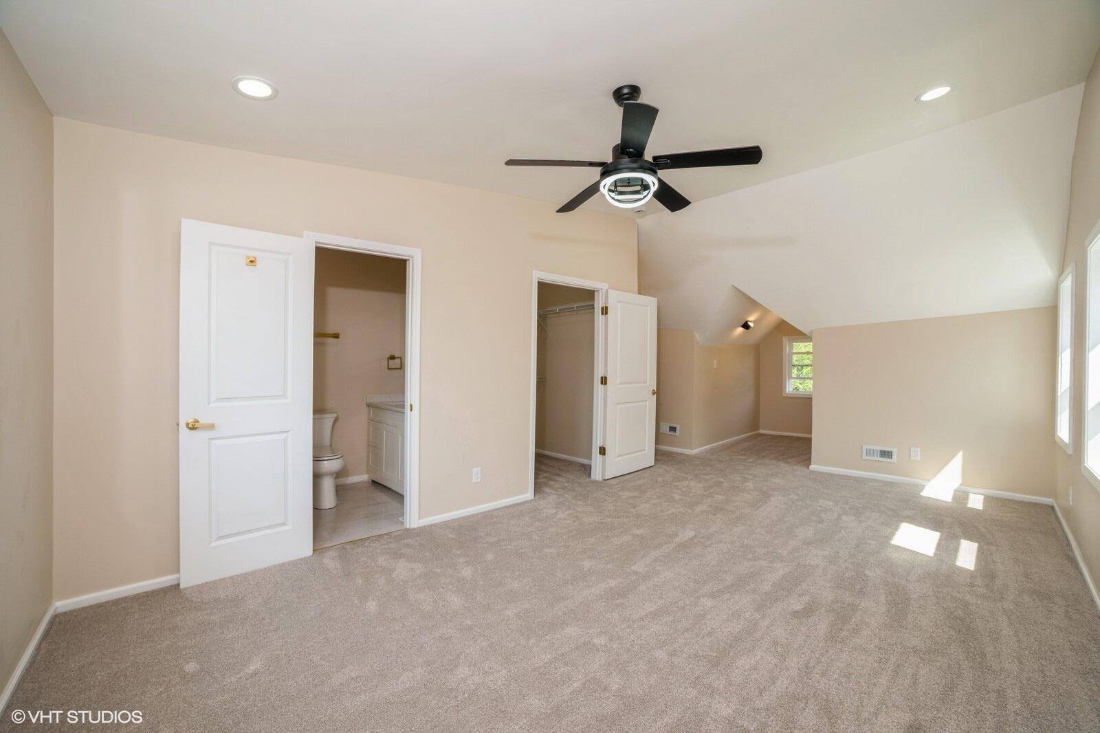 933 East 44th Place Gary, IN 46409 - Photo 16 of 28 a view of empty room with windows and ceiling fan