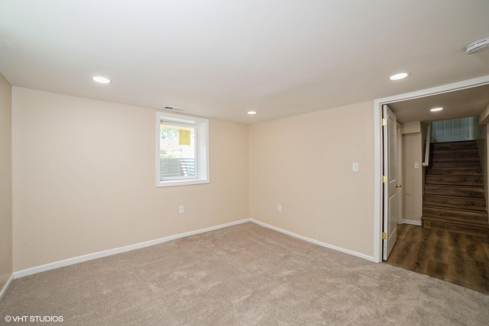 933 East 44th Place Gary, IN 46409 - Photo 21 of 28 an empty room with windows