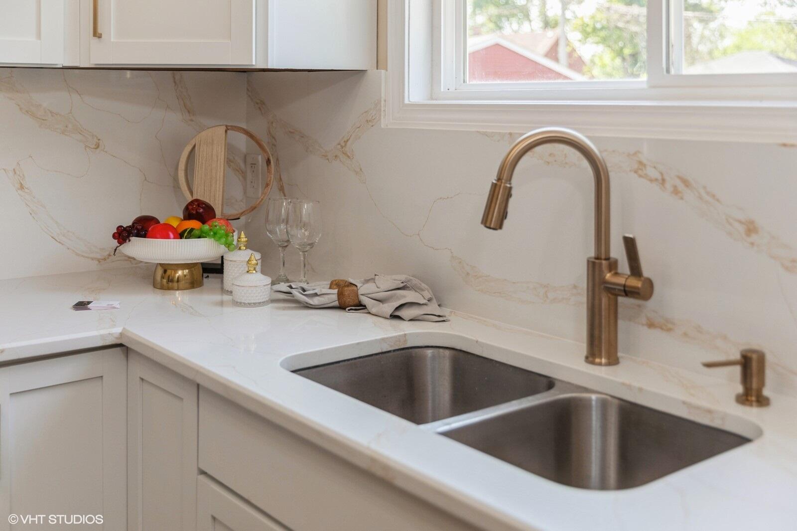 933 East 44th Place Gary, IN 46409 - Photo 24 of 28 a close view of sink and tap