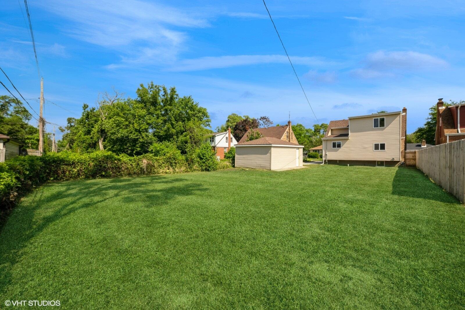 933 East 44th Place Gary, IN 46409 - Photo 27 of 28 a view of a backyard with sitting area