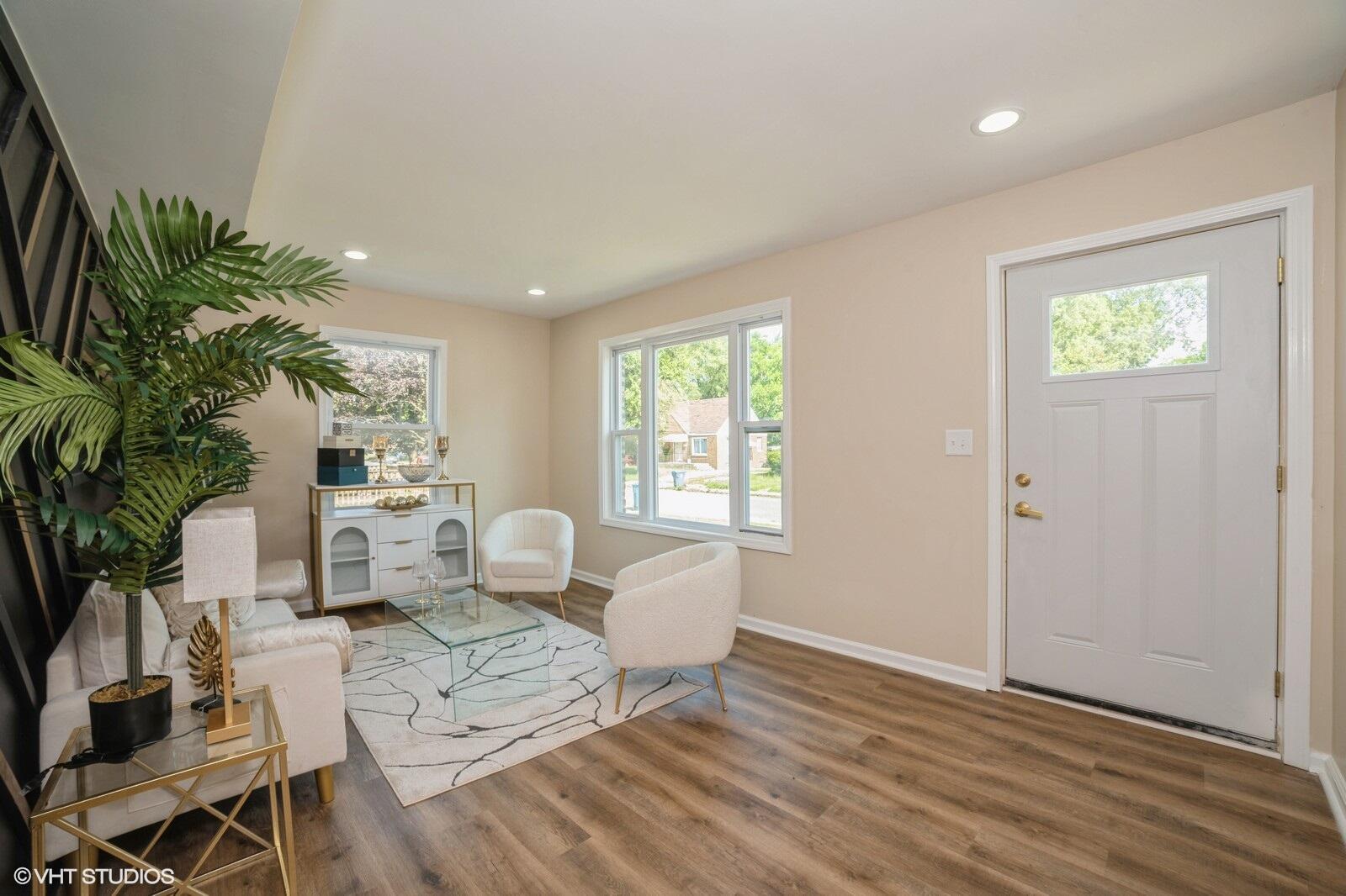 933 East 44th Place Gary, IN 46409 - Photo 5 of 28 a living room with furniture a window and a potted plant