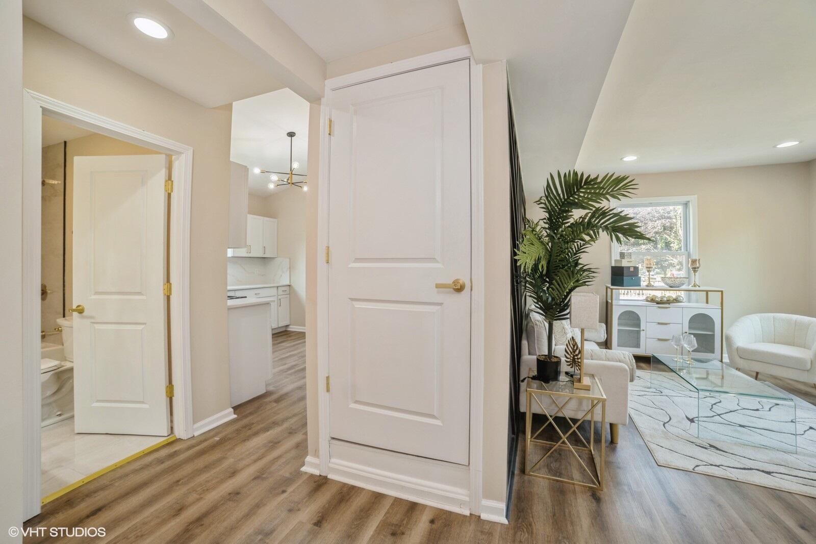 933 East 44th Place Gary, IN 46409 - Photo 7 of 28 a living room with furniture and a entrance to other room