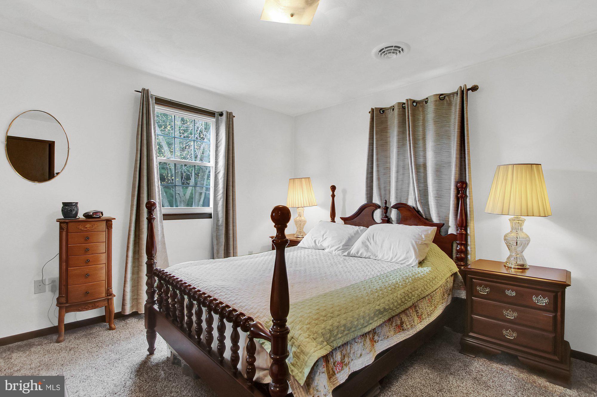 922 Hobart Road Hanover, PA 17331 - Photo 15 of 28 a bedroom with a bed and a window