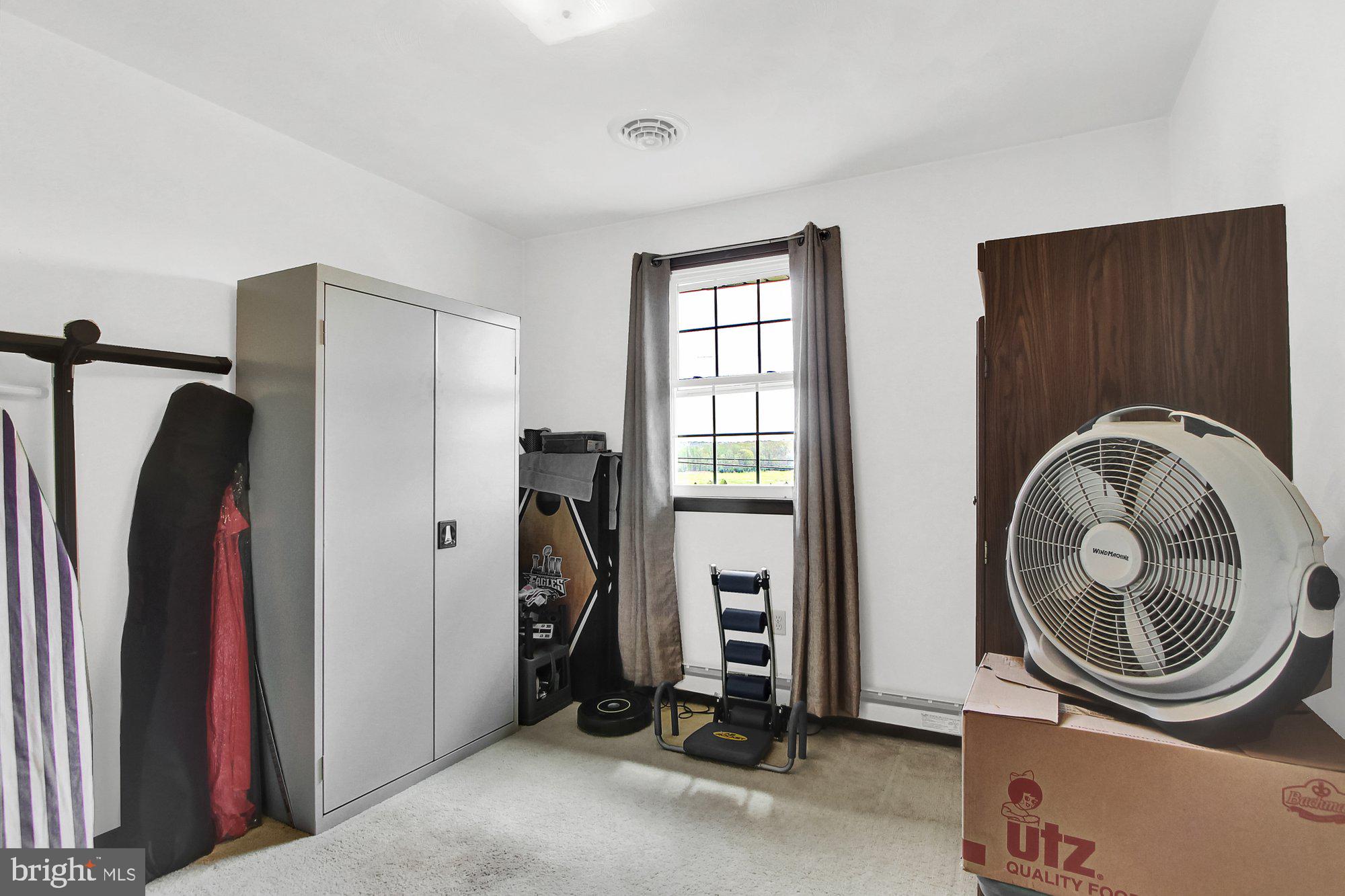 922 Hobart Road Hanover, PA 17331 - Photo 17 of 28 a view of a storage & utility room with washer and dryer