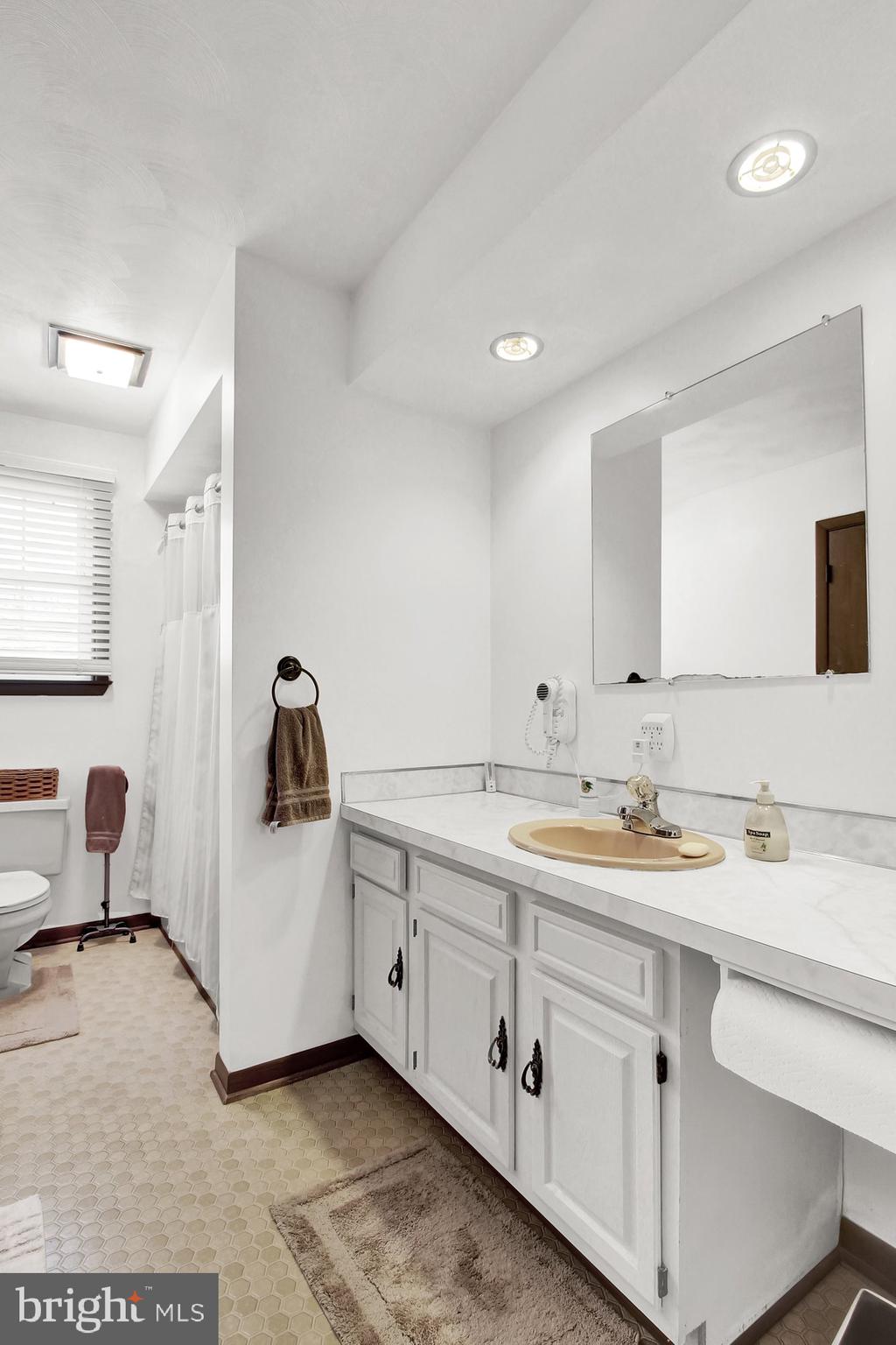 922 Hobart Road Hanover, PA 17331 - Photo 18 of 28 a view of a sink and a mirror