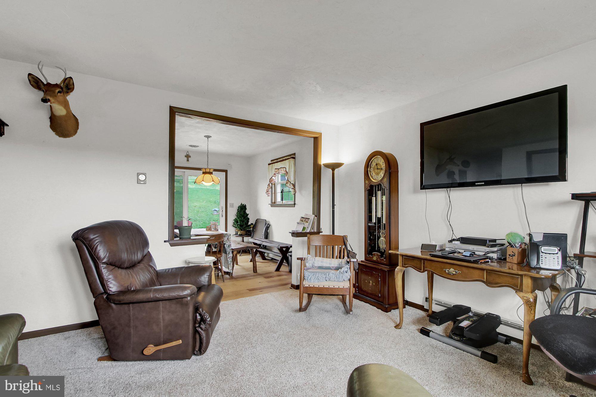922 Hobart Road Hanover, PA 17331 - Photo 5 of 28 a living room with furniture and a flat screen tv