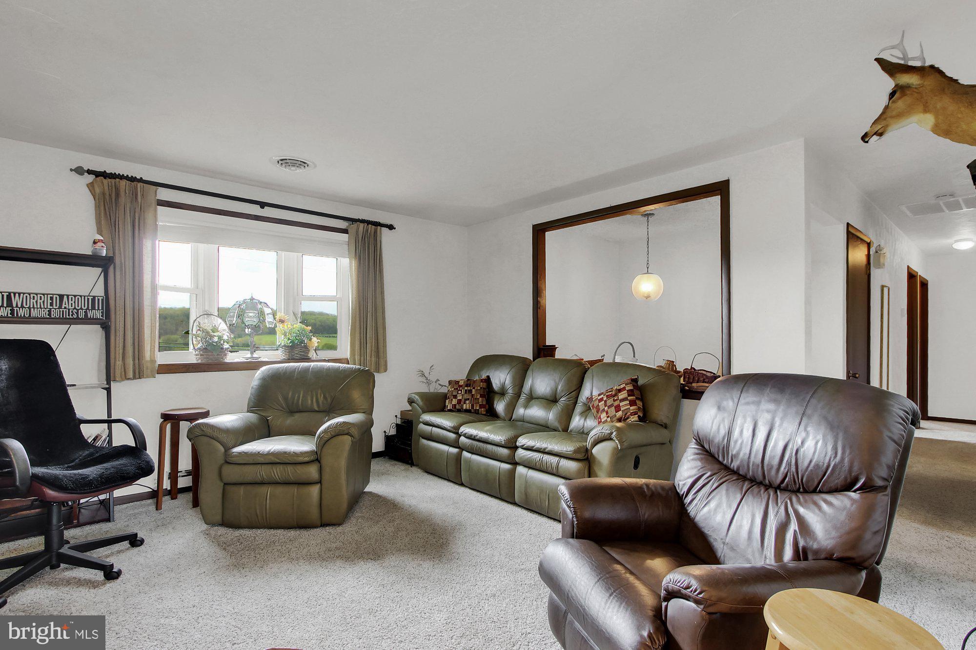 922 Hobart Road Hanover, PA 17331 - Photo 7 of 28 a living room with furniture and a large window