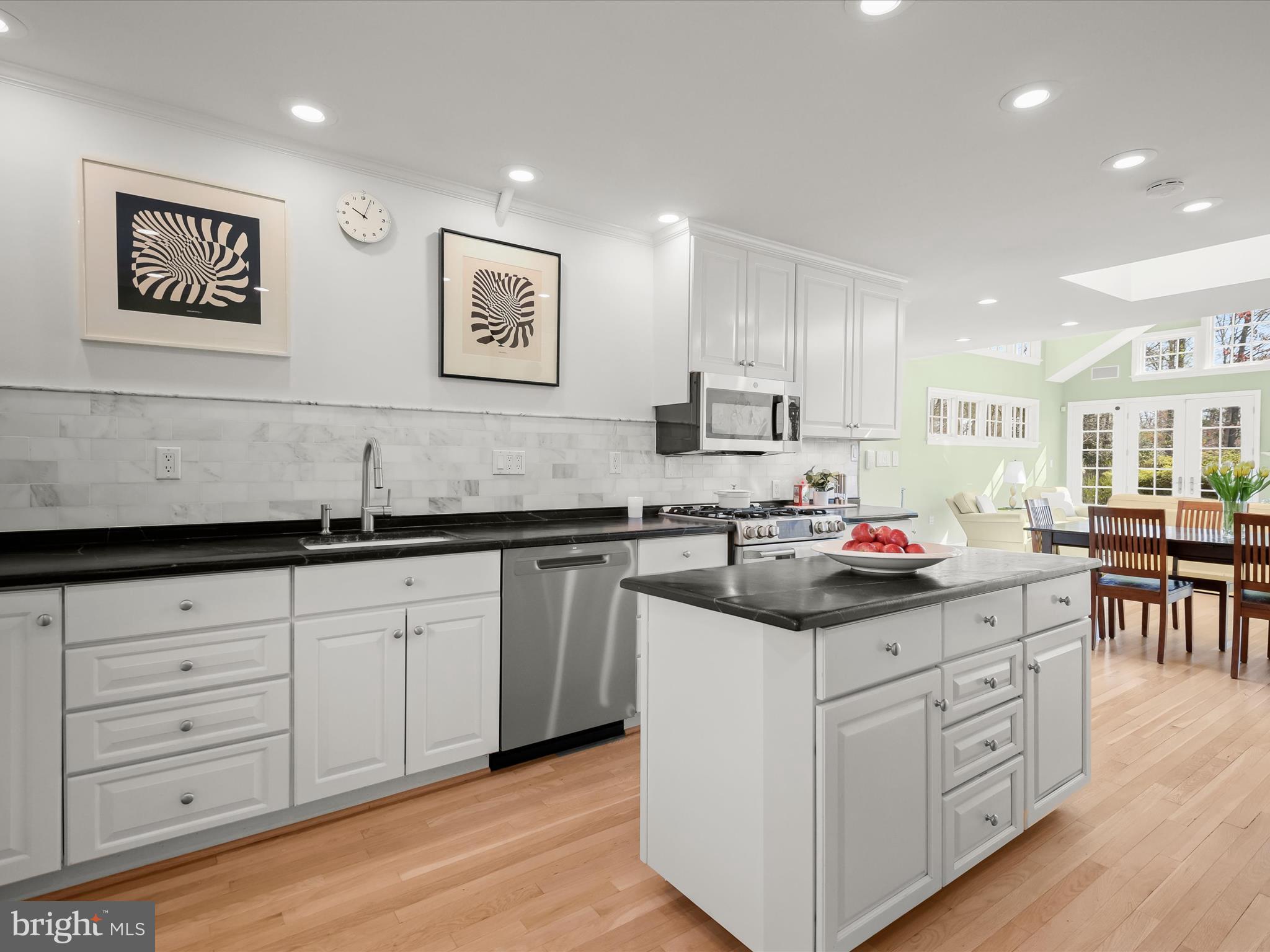 9305 Burning Tree Road Bethesda, MD 20817 - Photo 12 of 67 White Cabinets & Soapstone Counters