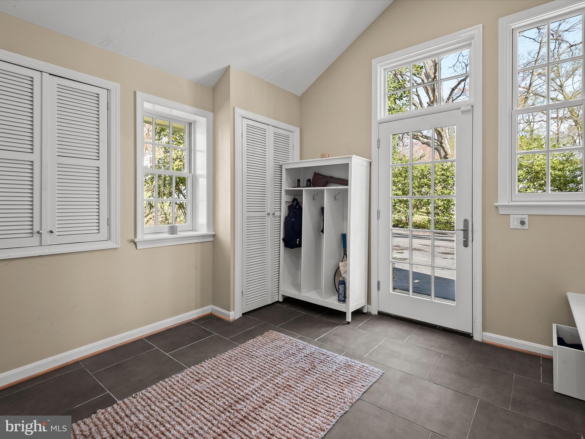 9305 Burning Tree Road Bethesda, MD 20817 - Photo 28 of 67 Mudroom & Driveway Side Door Entrance