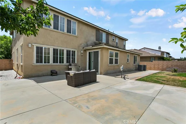 a house view with a outdoor space