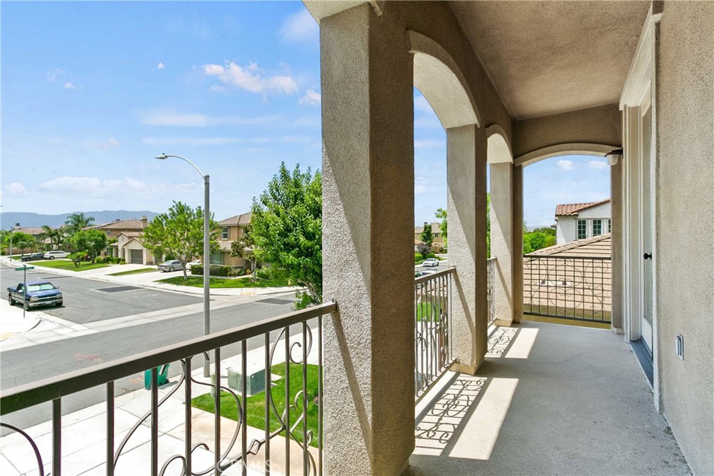 14496 Meadow Brook Eastvale, CA 92880 - Photo 29 of 33 a view of a balcony with wooden floor