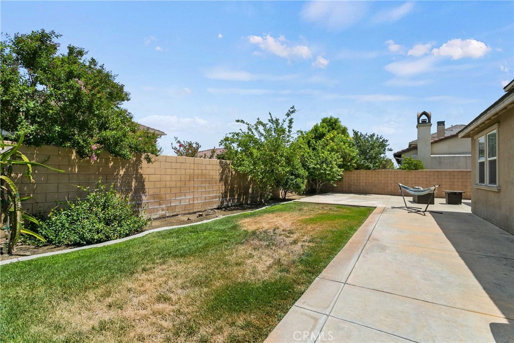 14496 Meadow Brook Eastvale, CA 92880 - Photo 32 of 33 a view of a backyard with sitting area