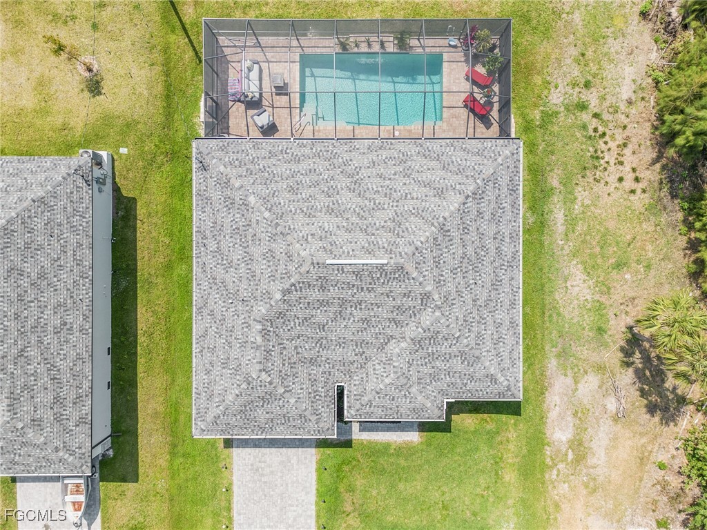 3505 Mango Street St. James City, FL 33956 - Photo 28 of 32 a bathroom with a sink and a mirror