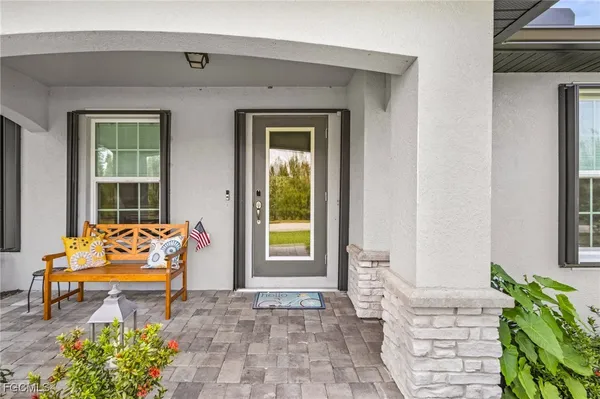 a backyard of a house with seating space