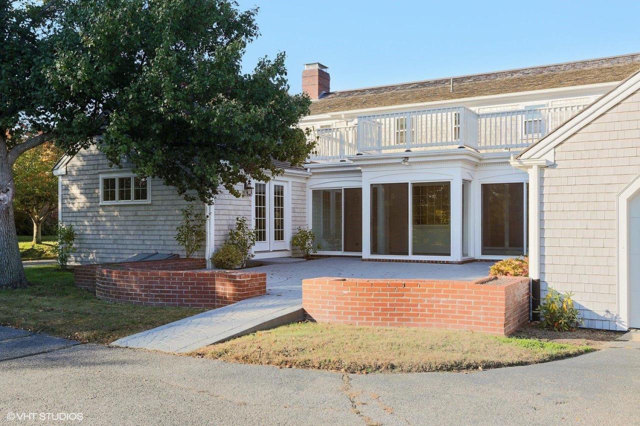 19 Salten Point Road Barnstable, MA 02630 - Photo 19 of 23 front view of house with a yard