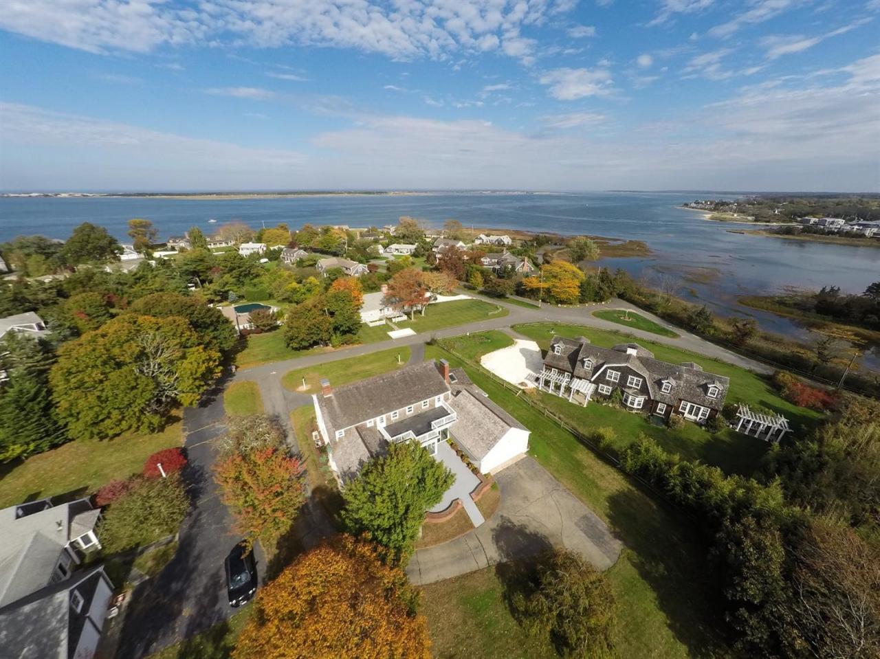 19 Salten Point Road Barnstable, MA 02630 - Photo 2 of 23 an aerial view of residential houses with outdoor space