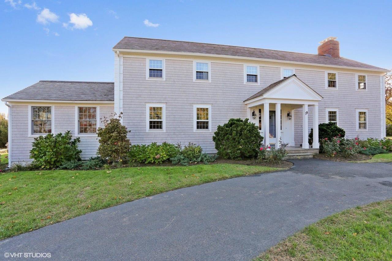 19 Salten Point Road Barnstable, MA 02630 - Photo 22 of 23 a front view of a house with a yard