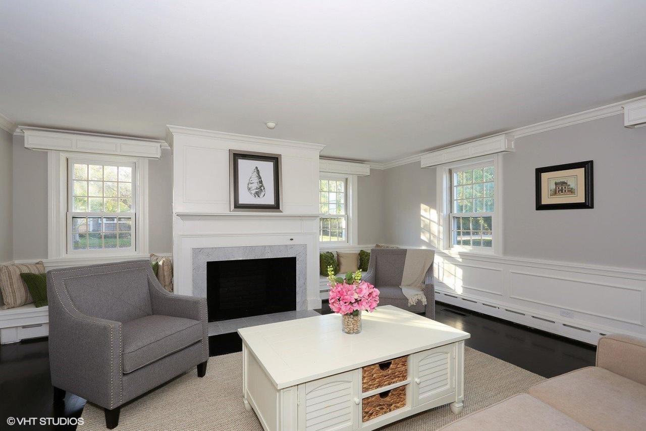 19 Salten Point Road Barnstable, MA 02630 - Photo 4 of 23 a living room with furniture and a fireplace